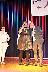 03 BenefitzMeiderich 2025-11-15 03  Auftakt, Prinzen-Proklamation, Auftaktsitzung - Samstag 15. November 10:30 Uhr, die Duisburger Karnevalsgesellschaften treffen sich auf der Königsstraße um zum Burgplatz zu ziehen. Dort dann die große Auftaktveranstaltung des Hauptausschuss Duisburger Karneval. Begleitet von der Prinzengarde ziehen wir mit. Abends dann die Prinzen-Proklamation von Bastian I. & Steffen I. in Moers. Danach geht es zur Benefizveranstaltung für den Blutwurstsonntags in Meiderich bei den Meidericher Jecken. Zum Ende des Abends ging es in die Aula des Reinhard-und-Max-Mannesmann-Gymnasium, wo wir von einem begeisterten Publikum bei der Auftaktsitzung der „Blauen Jungs“ empfangen wurden. : DVPJ, Toni I, Jules I., Prinz Karneval, Prinz, Prinzessin Aileen I., Hofmarschälle, Page, Pagen, Paginnen, HDK, Duisburg, Karneval, Helau, Tollität, Event, Session 2025, Session 2025, HDK Duisburg, Hauptausschuss, Hauptausschuss Karneval Duisburg, Duisburg ist echt